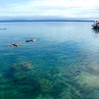 a small boat in a body of water