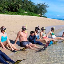 a group of people on a beach