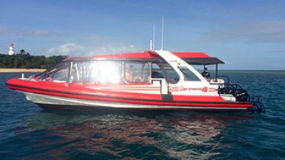 red ship in a body of water