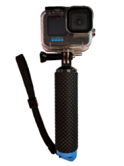 Action camera in waterproof case on handheld grip.
